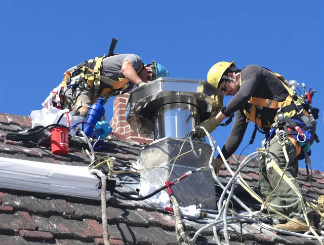 Protective chimney cap installed by Columbus Chimney Sweep in Columbus, OH