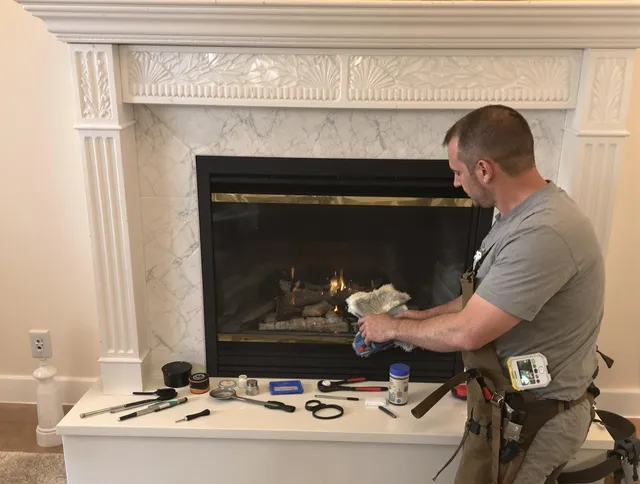 Columbus Chimney Sweep performing fireplace maintenance in Columbus, OH